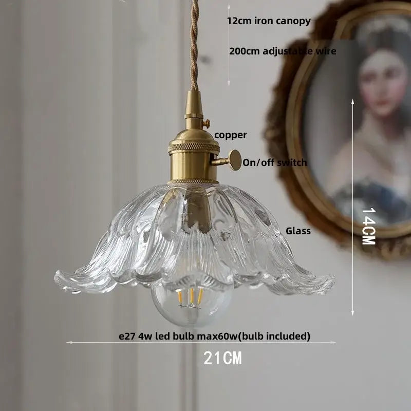 Clear glass led pendant light with fluted petal design and brass copper-finished hardware for kitchen lighting