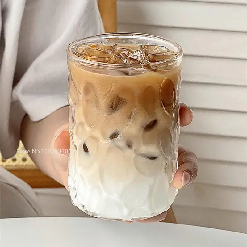 Hammered clear glass cafe coffee cup tumbler filled with iced coffee decorbites glass cafe beverage container