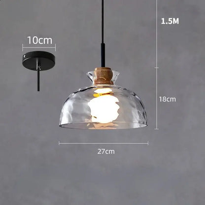 Clear glass pendant light with hammered glass dome, wooden cork accent, and black metal hardware for kitchen decorbites clear glass decor