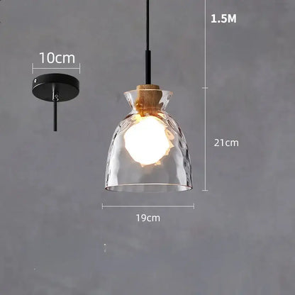 Clear glass pendant light with hammered texture cork accents and black metal hardware ideal for kitchen decorbites clear glass