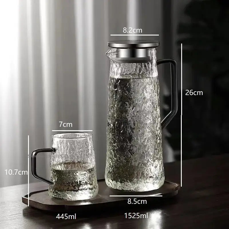 Clear textured glass water pitcher with black handle metallic lid 1525ml capacity for dining room decorbites gray amber water