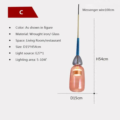 A sleek peach-tinted hand-blown decorbites candy glass pendant light with matte black iron top and blue accent wire