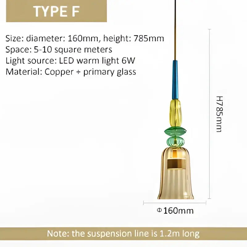 A hanging glass pendant light with copper and hand blown yellow and green textured glass segments for kitchen accent