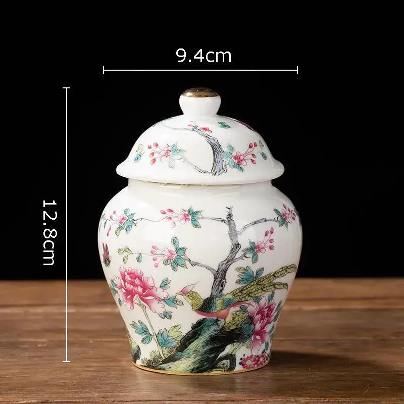 White porcelain tea canister with hand-painted pink peonies green branches and birds for kitchen storage