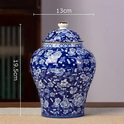 Blue and white hand-painted floral white porcelain tea canister with gold accents for kitchen storage