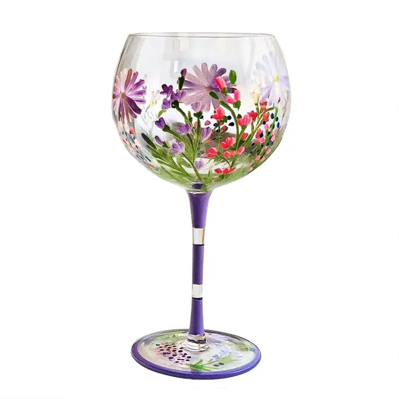 Hand-painted floral wine goblet with vibrant purple pink and green design on clear decorbites crystal glass bowl
