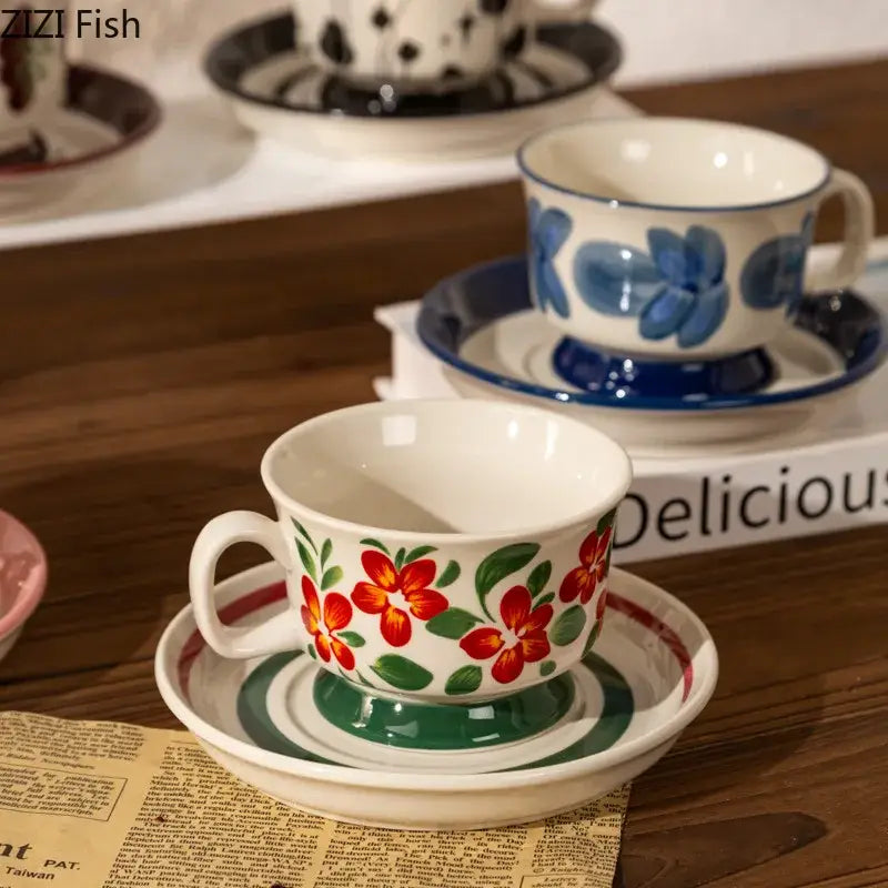 White ceramic cup and saucer set with decorbites flowers pattern hand-painted red and green floral design for dining room decor