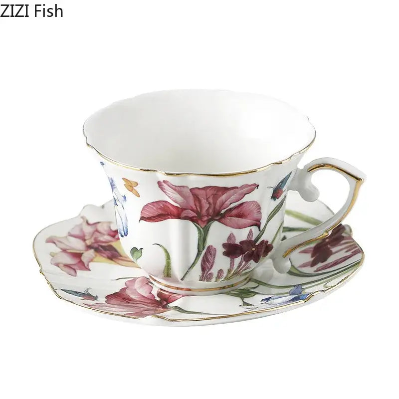 A delicate white porcelain tea cup and saucer hand painted with iris flower patterns and gold trim for elegant tableware