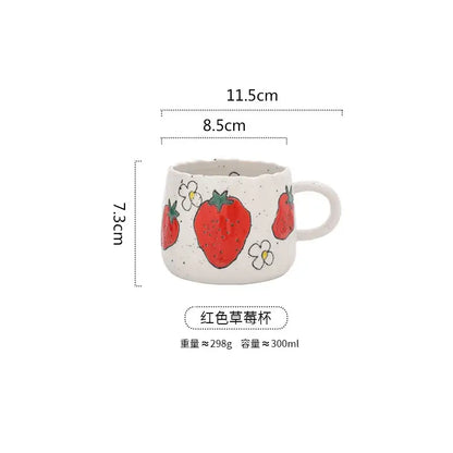White ceramic hand-painted cartoon fruit ceramic mug with red strawberries and speckled texture for kitchen tea use
