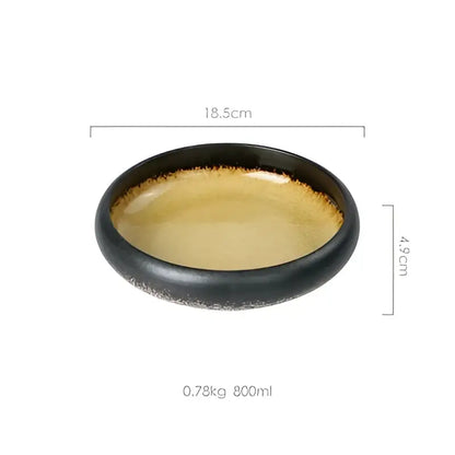 Black ceramic sushi plate with golden interior glaze and speckled rim handcrafted ceramic sushi plate for dining
