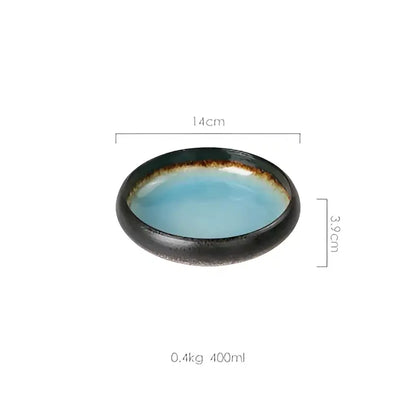 A sleek ceramic sushi plate with a glossy turquoise interior and dark earthy rim handcrafted for dining use