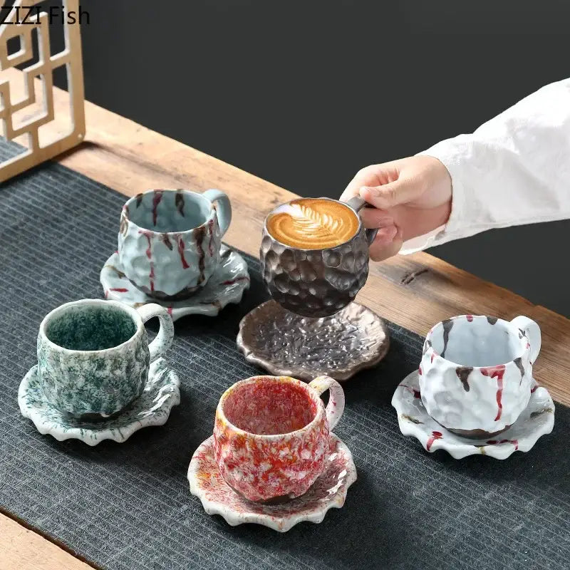 Handcrafted blue and red hammer pattern ceramic mug set with textured glazed surfaces for dining room use