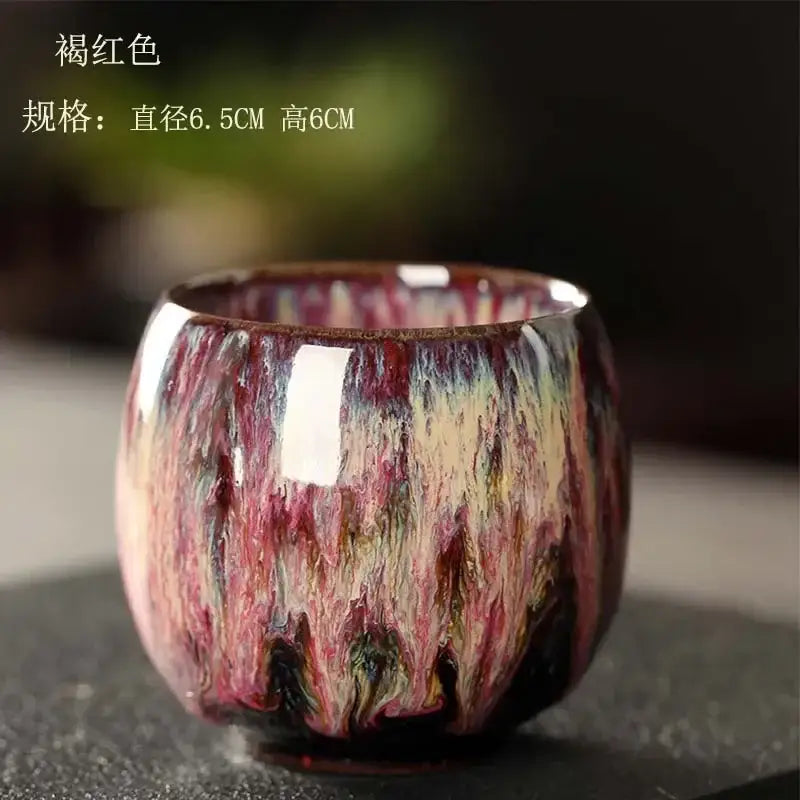 Handcrafted ceramic kung fu tea cup set featuring a glossy crackle glaze with deep reds purple and cream tones