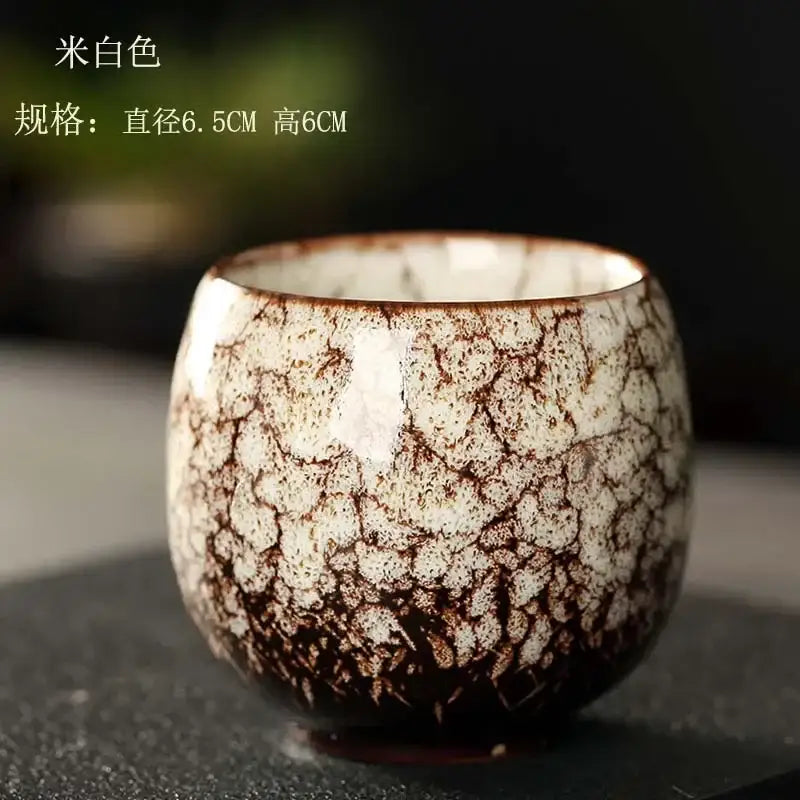 Handcrafted crackle glaze ceramic kung fu tea cup set in white with brown glaze and textured surface for tea decorbites
