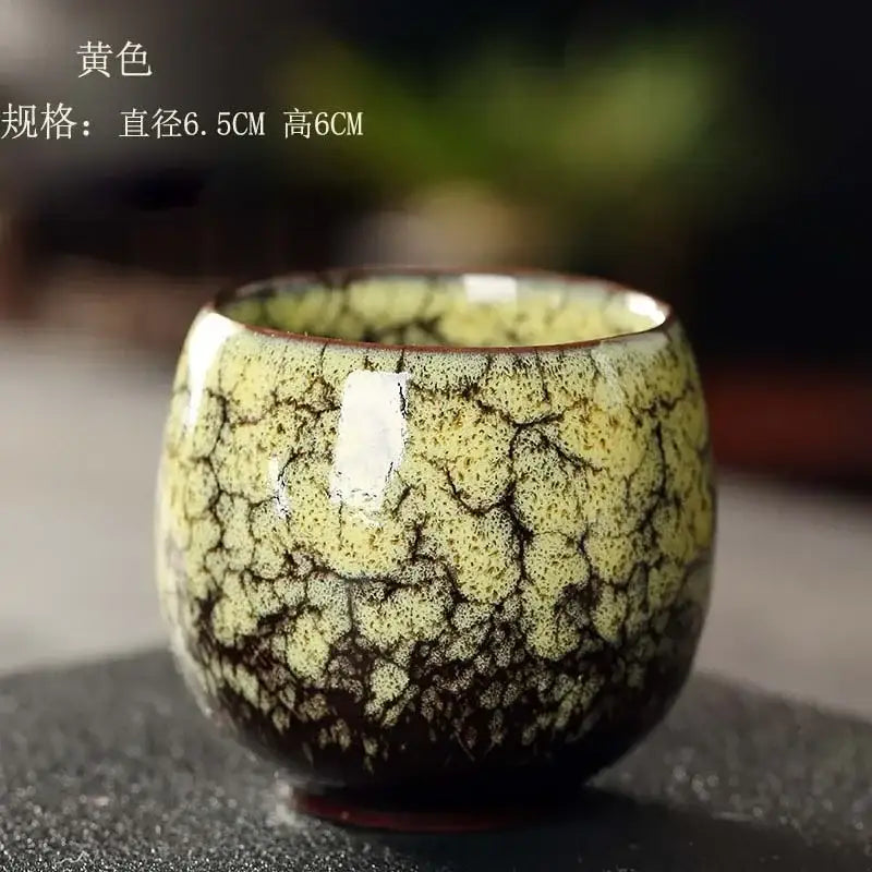 Handcrafted yellowish-green ceramic kung fu tea cup set with crackle glaze and intricate web-like pattern for drinkware decorbites ceramic kung