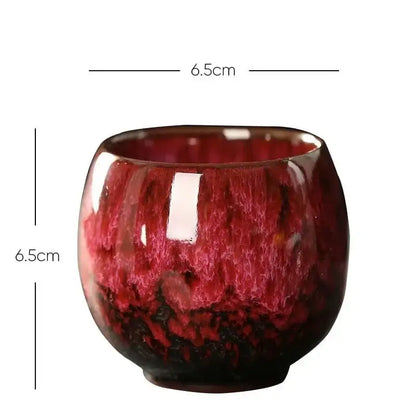 A glossy handcrafted ceramic kung fu tea cup set with deep red and maroon crackle glaze for dining room decorbites
