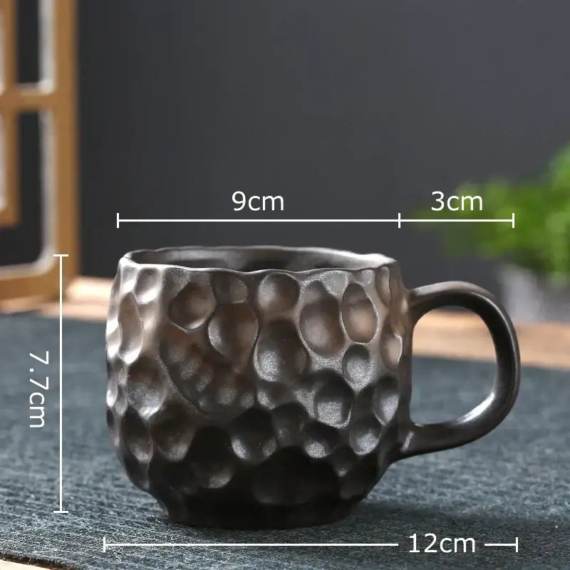 Dark gray hammered pattern porcelain mug with textured raised circular design and sturdy handle set of 2 for kitchen use