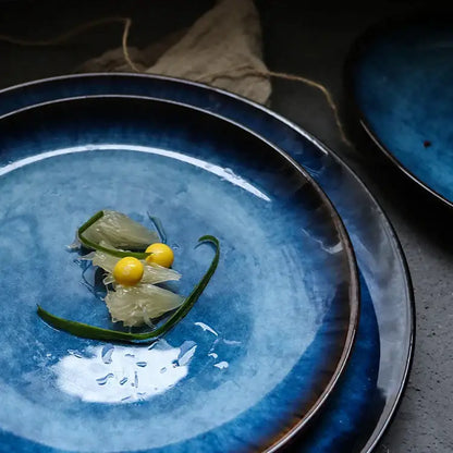 Deep blue handcrafted ceramic round plate with glossy gradient glaze and subtle texture for dining room set of 3