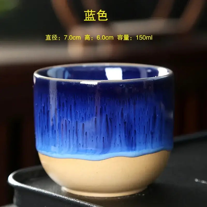 Handcrafted ceramic kung fu tea cup with gradient blue glaze and unglazed beige base from decorbites collection