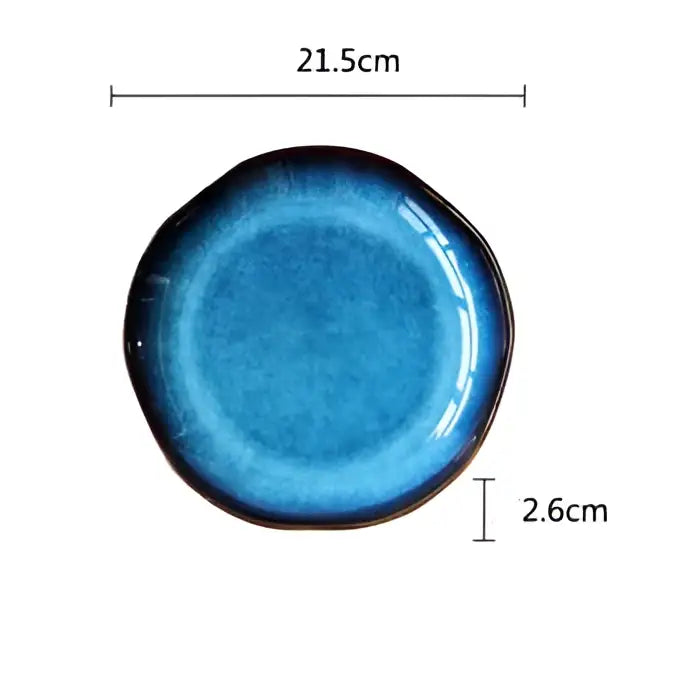 Handcrafted deep blue ceramic dessert plate with glossy finish and irregular edges from decorbites deep blue set