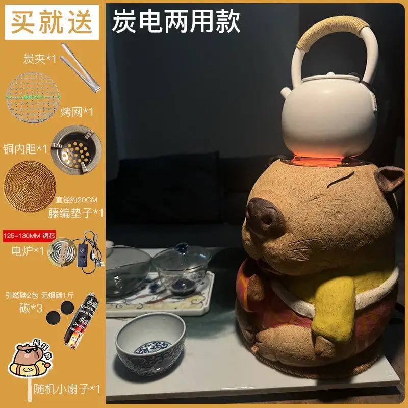 White ceramic teapot with woven handle resting on handmade capybara refractory carbon oven surrounding stove tea warmer