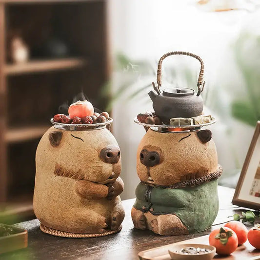 Handmade earthenware capybara tea warmer with woven handles and ceramic lids for refractory carbon oven use