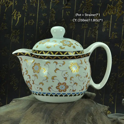 Handmade decorbites ceramic kung fu teapot in white with gold brown floral patterns and blue decorative bands for tea decor