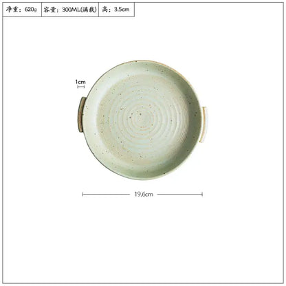 A light green speckled handmade ceramic sushi plate bowl with two handles measuring 19.6cm diameter and 300ml capacity
