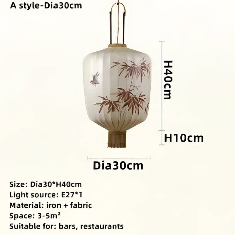 Handmade cream and peach bamboo lantern pendant with delicate bird illustrations crafted from iron and fabric decorbites bamboo lantern