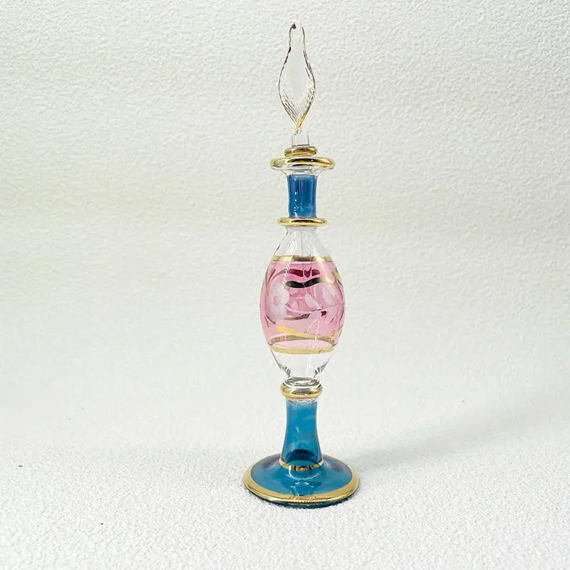 Handmade glass bottle with blue gold accents pink floral etching and clear twisted stopper as exquisite ornament for decor