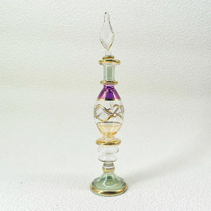 Handmade glass bottle with purple gold accents and leaf stopper as an exquisite ornament for living room decor