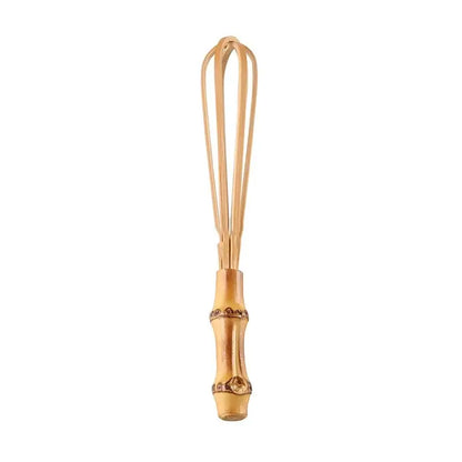 Handmade golden bamboo egg beater with decorative segmented handle and thin wire loops for flour mixer use