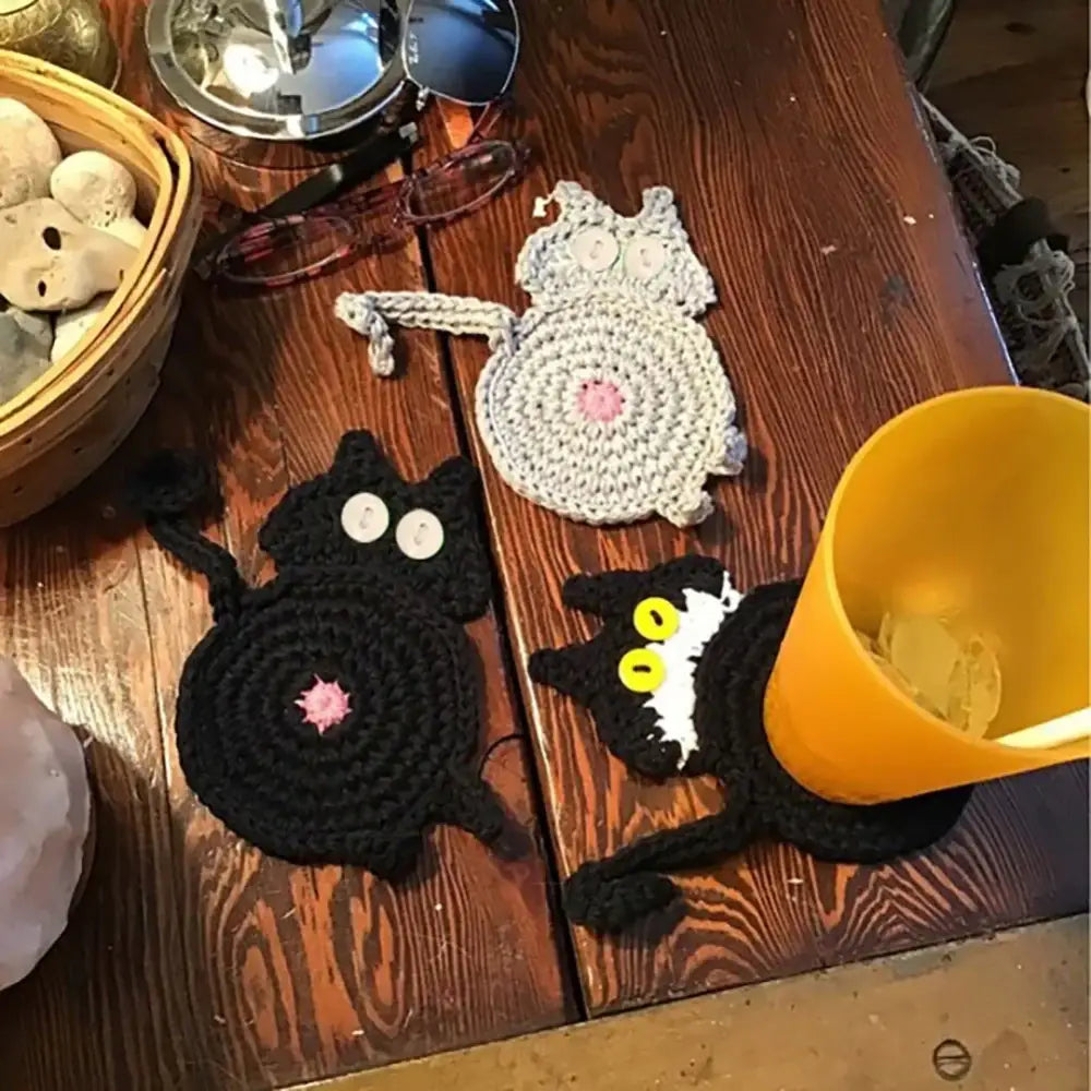 Handmade crocheted cat butt coasters set of three featuring black, gray, and black-and-white decorbites cat butt designs