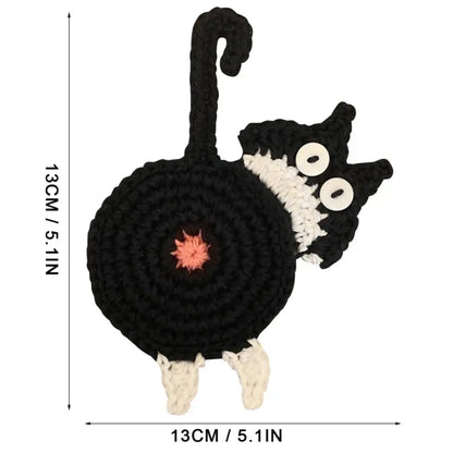 Handmade black crocheted cat butt coaster with white accents and pink embroidery by decorbites cat butt set of 4