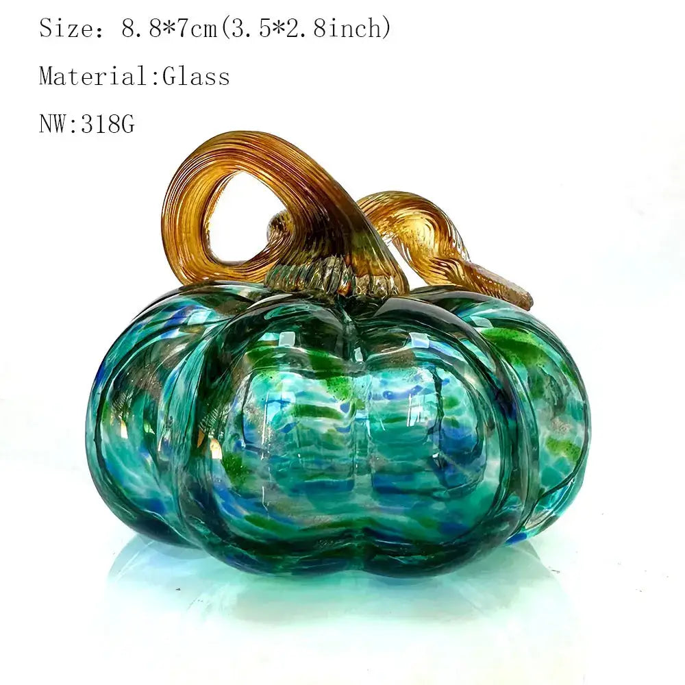 Handmade iridescent teal and green glass pumpkin figurine with a golden brown stem for living room decor