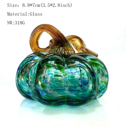 Handmade iridescent teal and green glass pumpkin figurine with a golden brown stem for living room decor