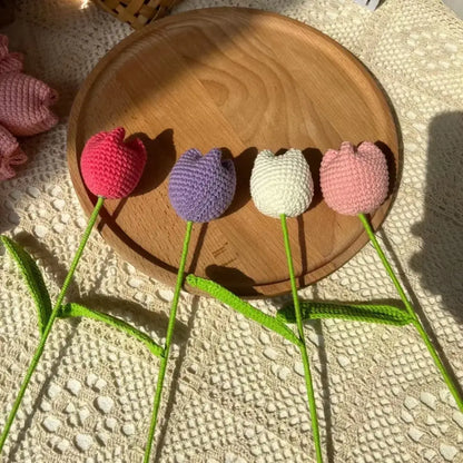 Four decorbites handmade knitted crochet tulips in pink purple white and light pink with green stems for bedroom decor