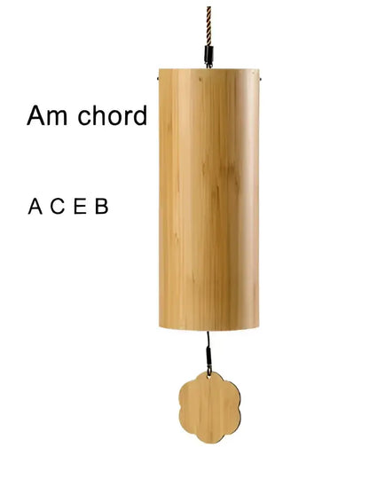 Natural tan bamboo chord wind chimes with light wood finish and scalloped charm for garden decor