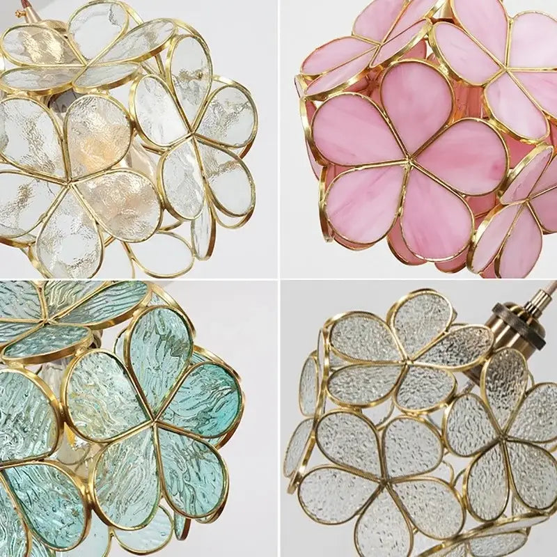 Handmade pendant light featuring delicate pink and teal glass petal pendant with gold-toned metal frame for bedroom