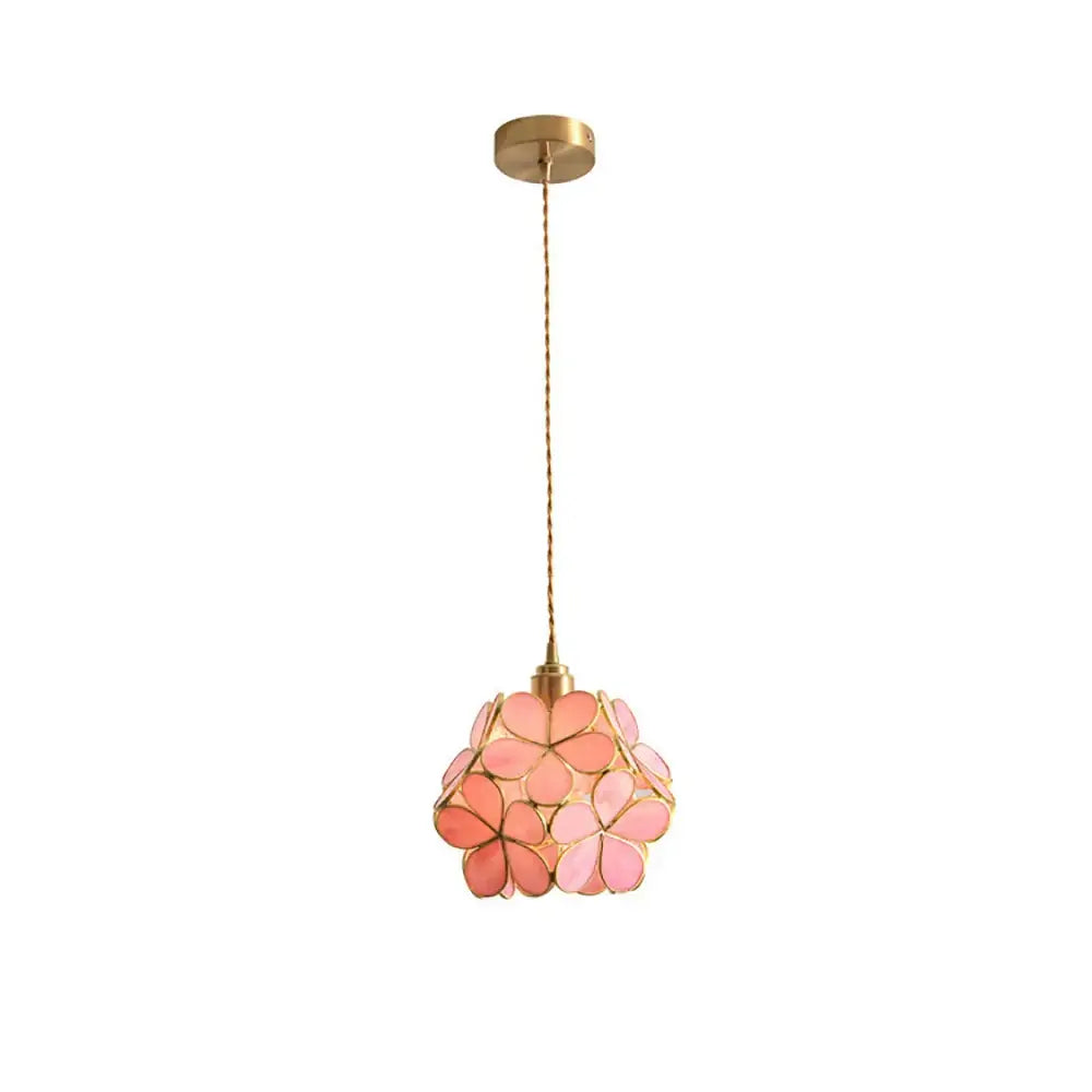 Handmade pink and teal glass petal pendant light with brass accents and twisted cord for bedroom lighting