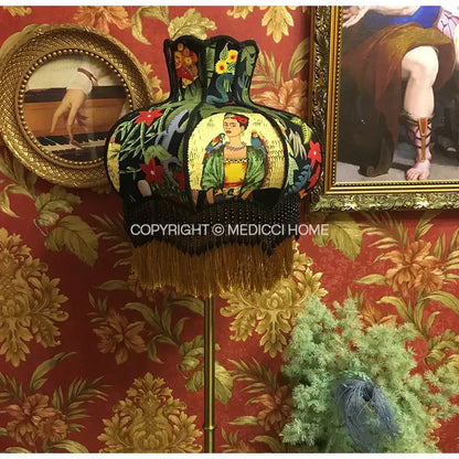 Handmade vintage jungle lampshade featuring vibrant frida kahlo embroidery with floral and bird motifs and black beaded fringe