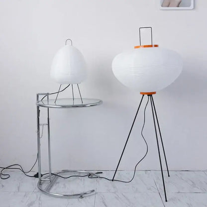Handmade wabi sabi cream paper floor lamp with white lantern shade black tripod stand and orange rim decorbites handmade wabi