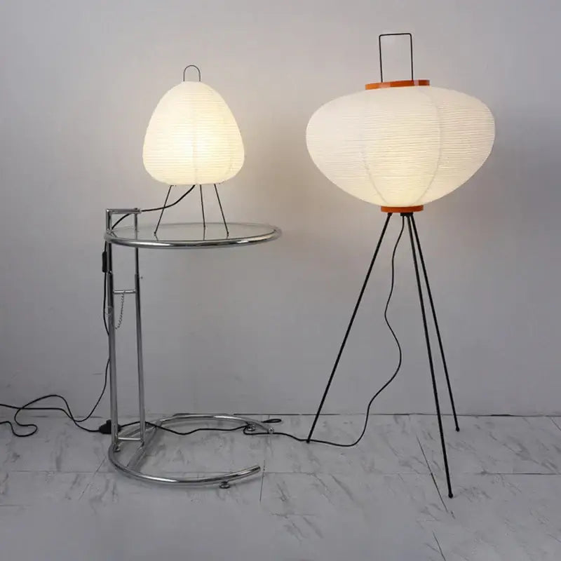 Handmade wabi sabi cream paper floor lamp with white lantern shade black tripod base and orange accent ring decorbites floor lamp