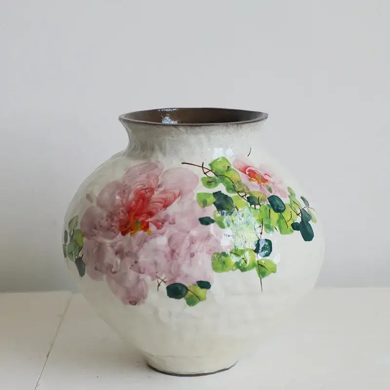 Hand-painted ceramic watercolor flower vase with textured white surface and pink red blossoms for living room decor