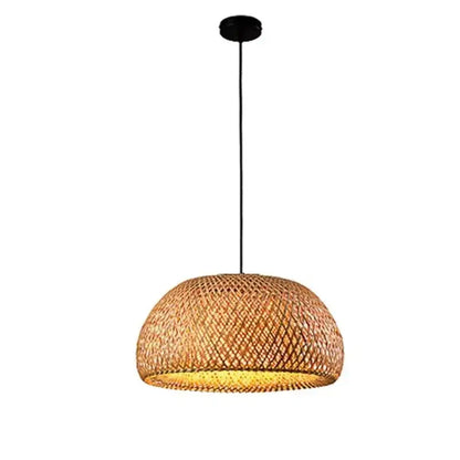 Handwoven beige tone bamboo dome pendant light with warm golden glow made from natural materials for dining room