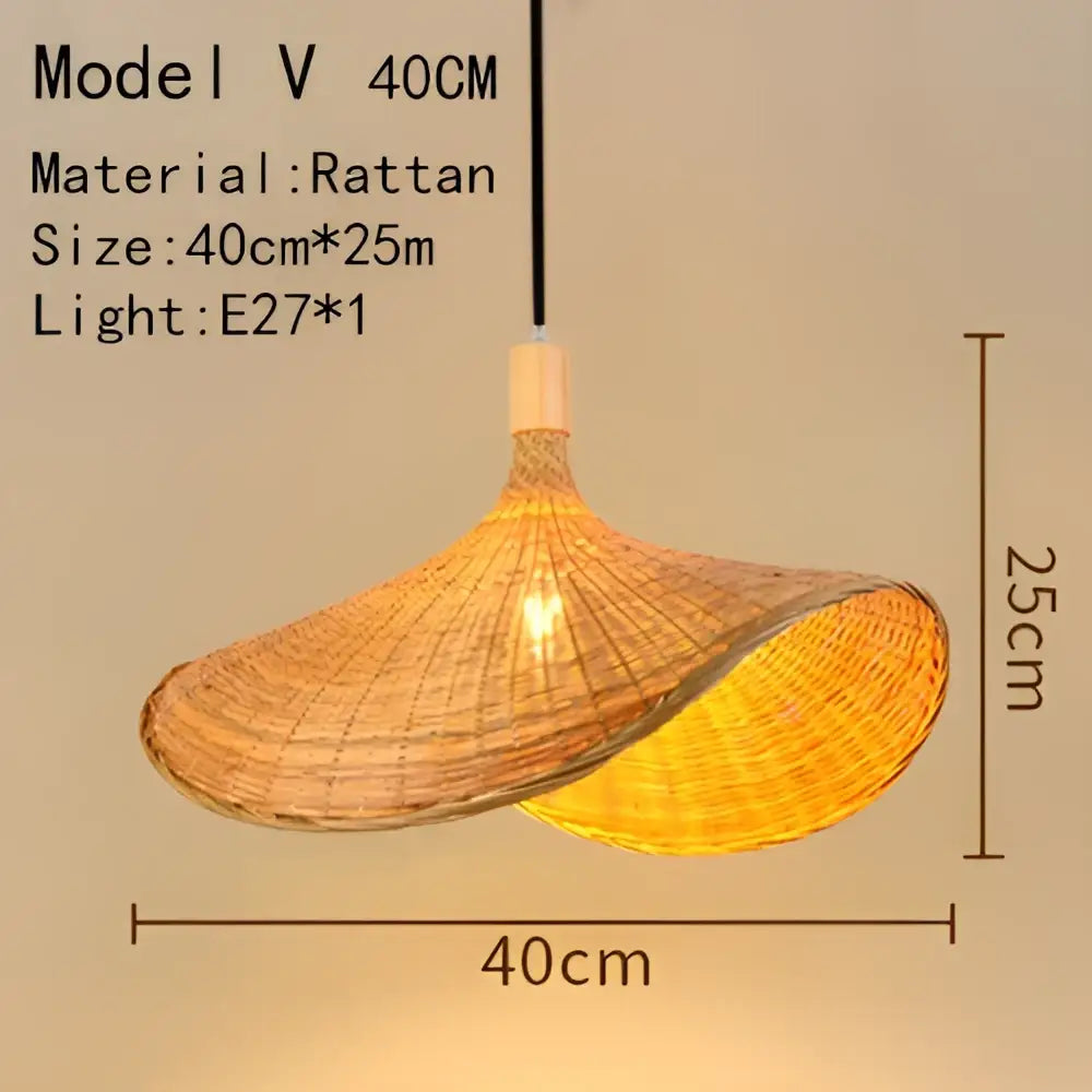 Handwoven black woven pendant light with natural rattan and warm golden glow for elegant dining room lighting