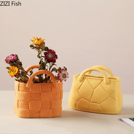 Orange handwoven ceramic vase basket planter with handles filled with dried flowers for living room decorbites decor
