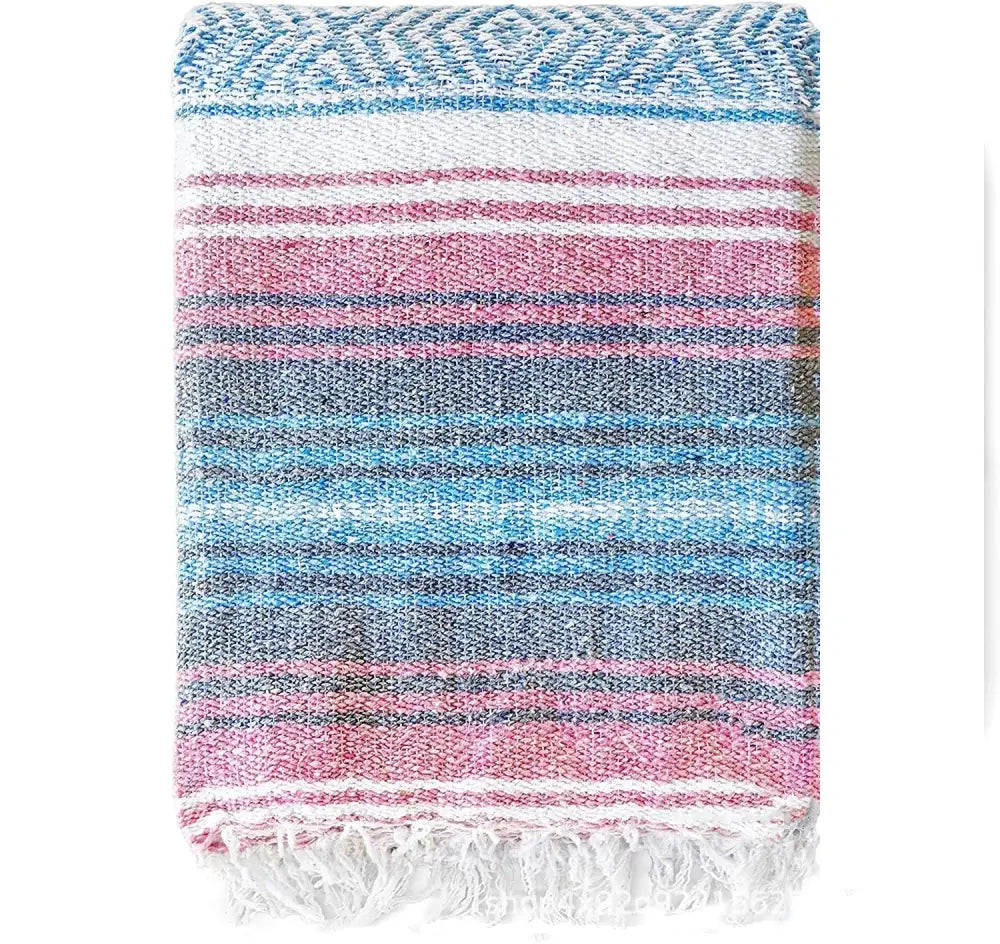 Handwoven mexican blanket with pink blue geometric stripes and white fringe by decorbites for beach or bedroom decor