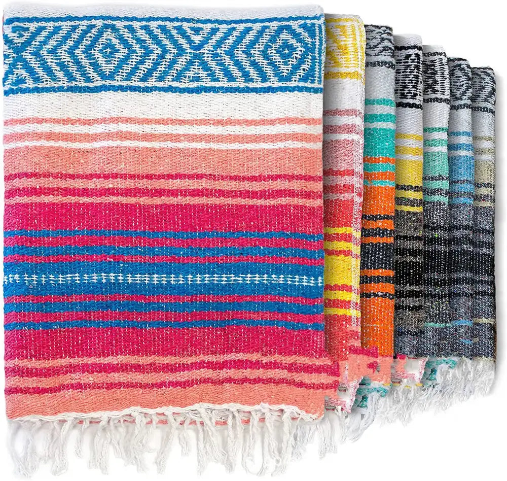 Handwoven mexican blanket by decorbites with pink coral blue stripes geometric border and white fringe for decor