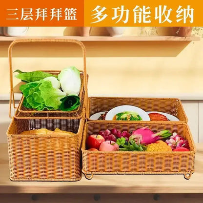 Woven wicker three-tiered shopping basket with handle and wheels in natural tan for handwoven rattan picnic use